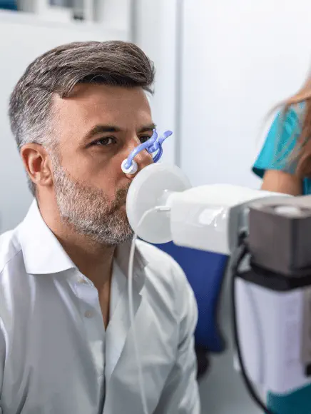 person having lung test